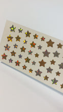 Load and play video in Gallery viewer, PMS711 STAR STICKERS GOLD/SILVER

